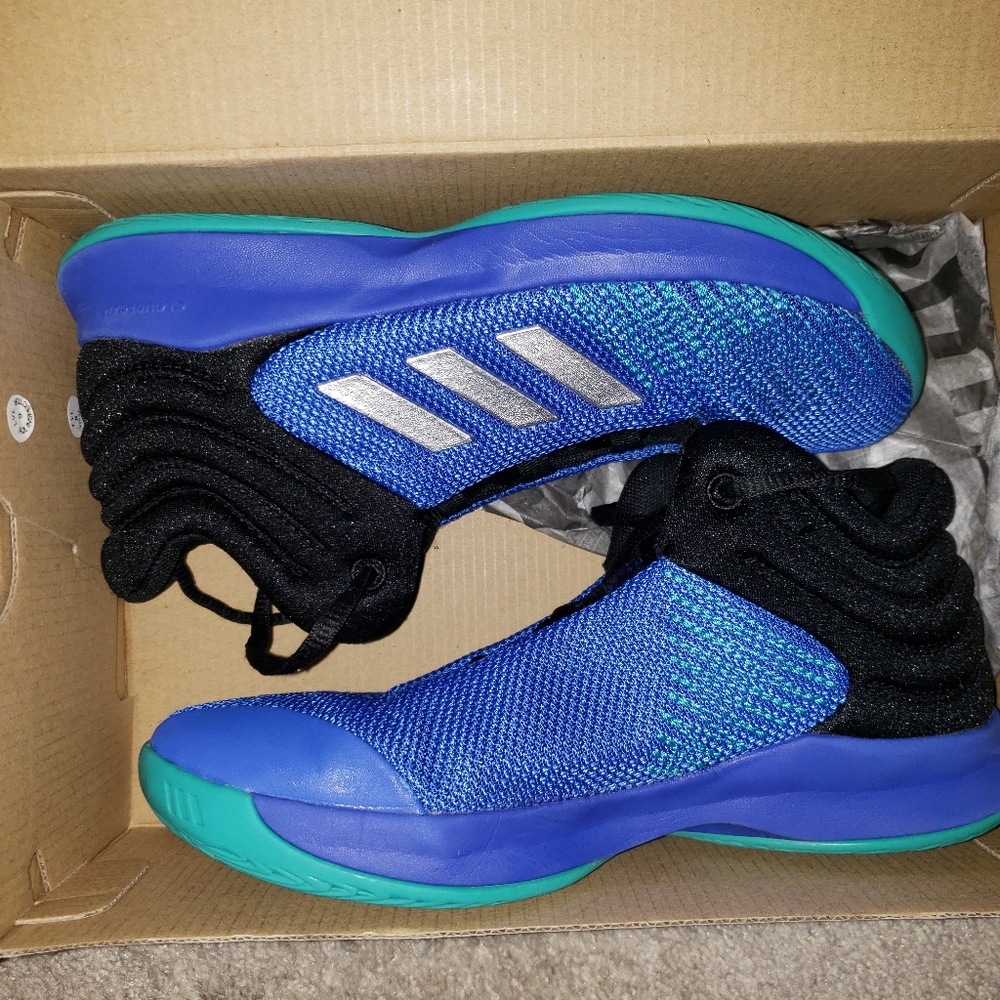 2 pair of boys Adidas.